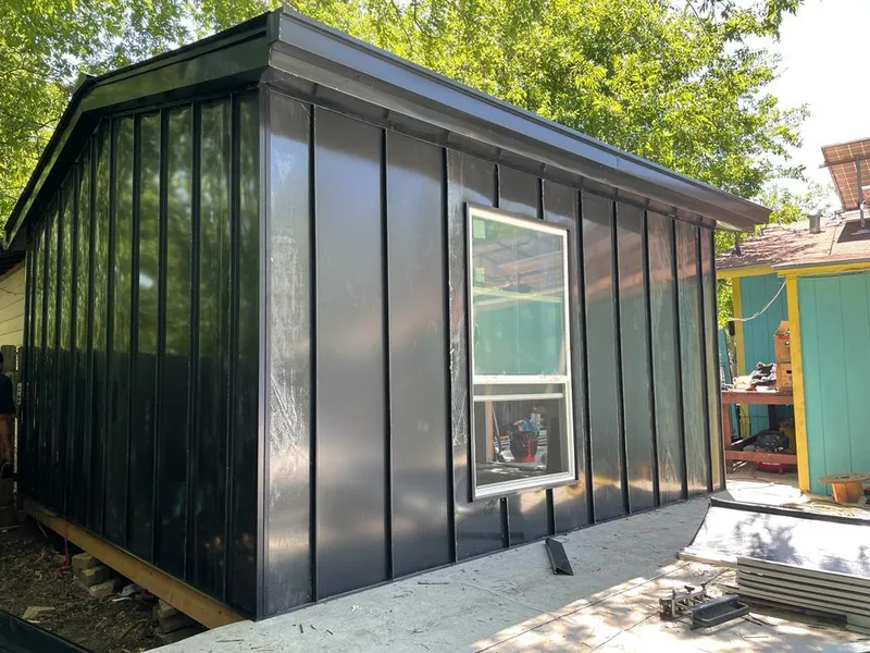 Black standing seam metal wall panels for Roof Inspection in Cedar Falls